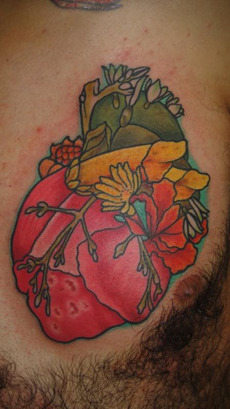 Esteban's Flower Heart Tattoo